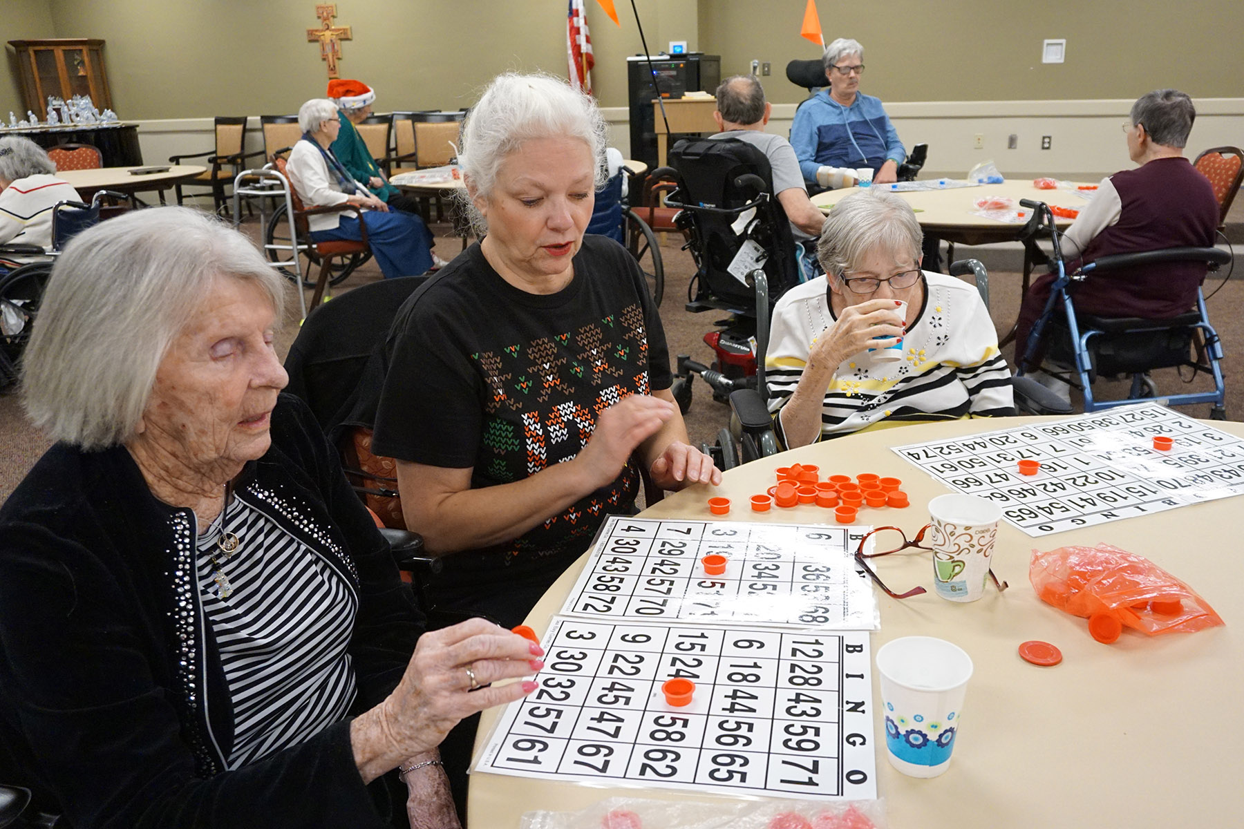 Volunteer Playing Bingo with Residents